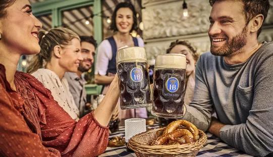 dark beer in beer mug in beer garden